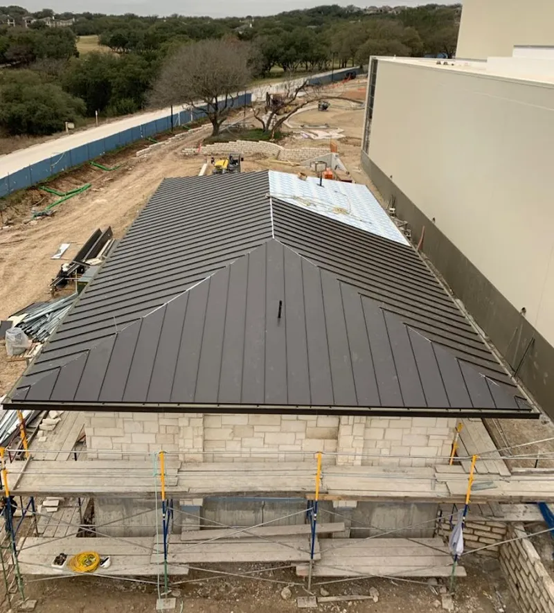 Metal roof new construction with scaffolding in Cecil