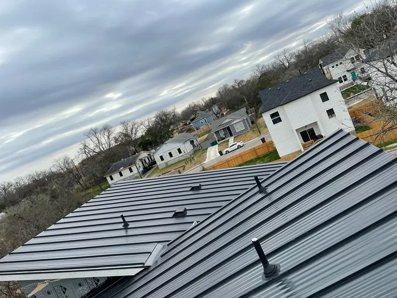 Standing seam metal roof panels with vents for Skylight Repair in Cecil
